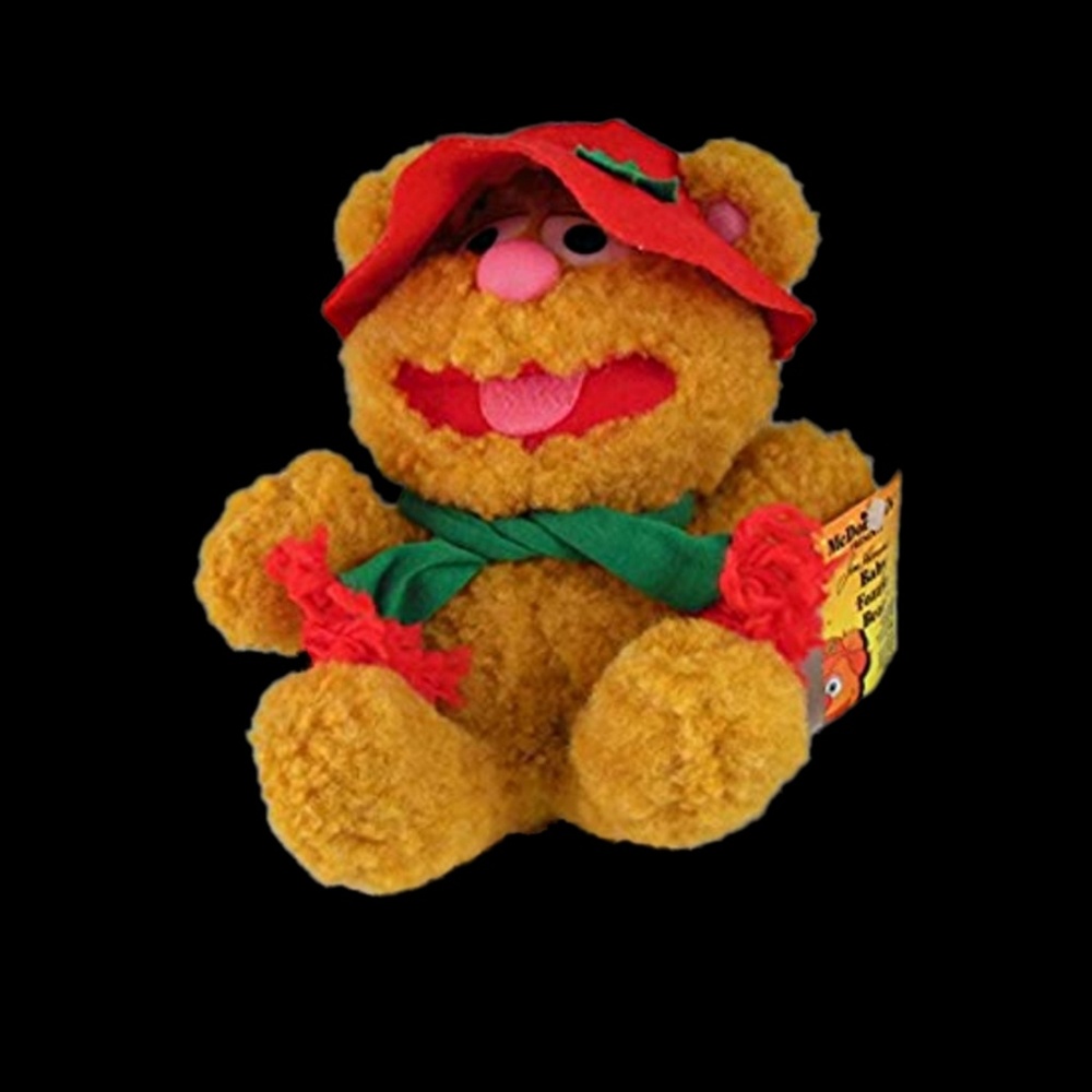 Baby Fozzie Bear is a 8" plush bear wearing a hat